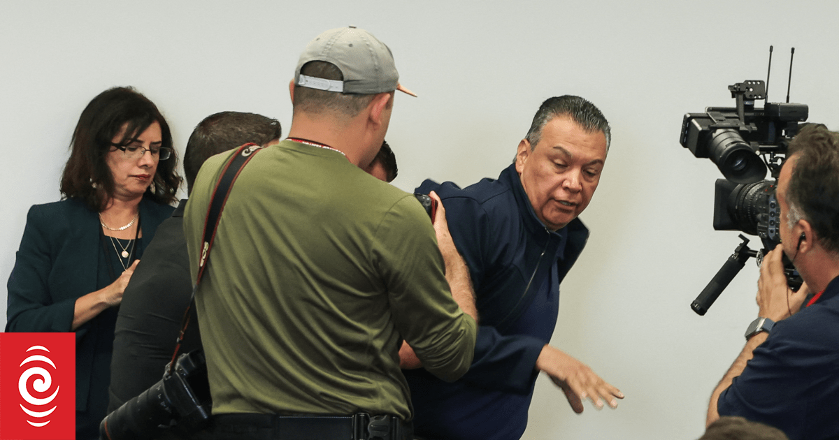 US senator forcibly removed from Trump official's press conference