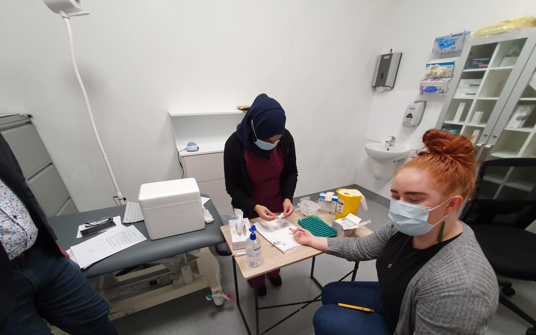 RNZ reporter Ella Stewart's blood is taken to be tested to check how protected she is from Covid-19