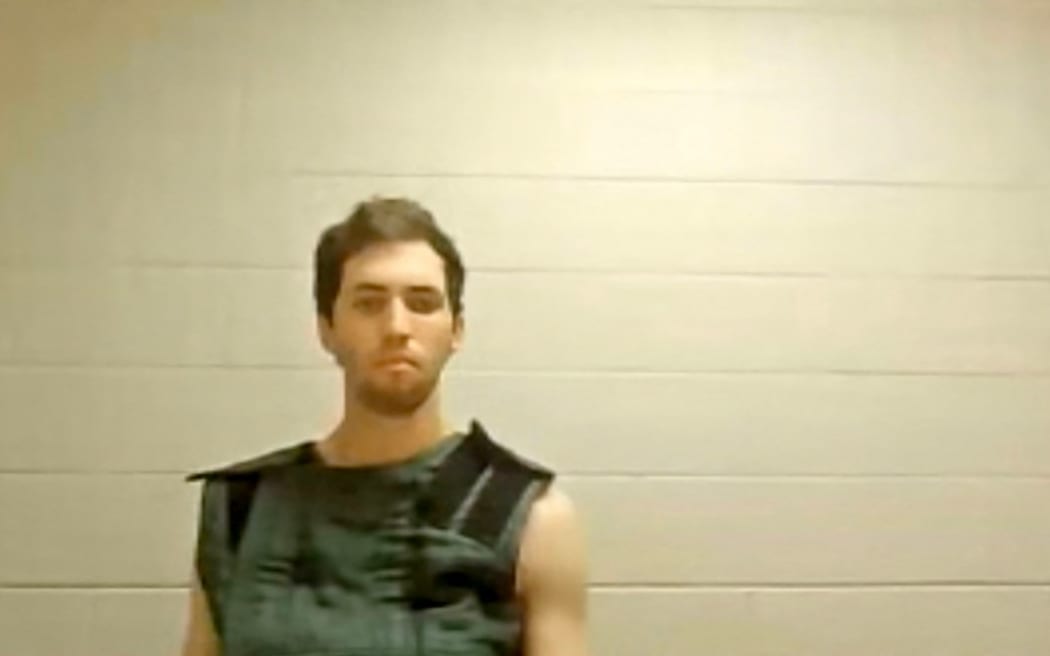 This screengrab from the Utah Court live streaming shows Tyler Robinson, the suspect in the killing of political activist Charlie Kirk, attending a court appearance remotely from his jail cell in Provo, Utah, on 16 September, 2025.