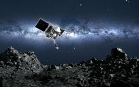Artwork: Osiris-Rex approaching the surface of Asteroid Bennu.