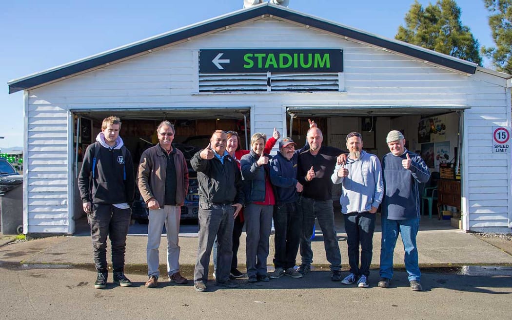 Members of the Four Stroke Engine Club at Manfeild, with Dr Sara Joice (fifth from left)
