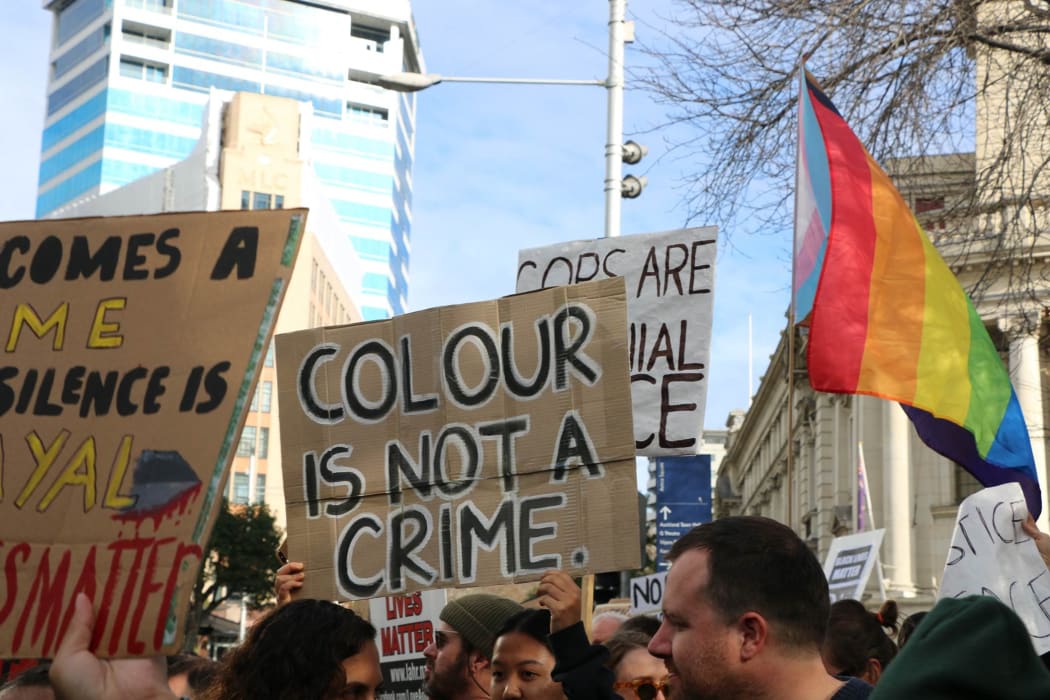 Protesters hold up their signs in Aotea Square, Auckland at the Black Lives Matter rally on 14 June, 2020.