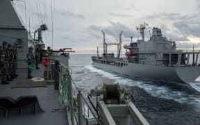 The HMNZS ENDEAVOUR in company with an Australian frigate while working with the Royal Australian Navy during her deployment