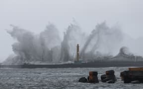 Huge waves are seen in Yilan as Typhoon Haikui makes landfall in eastern Taiwan on September 3, 2023. (Photo by I-Hwa Cheng / AFP)