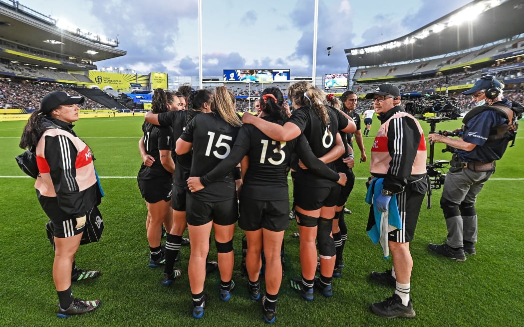 The Black Ferns team huddles during their one-point semi-final win over France at the Rugby World Cup.