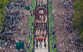 The Ceremonial Procession of the coffin of Queen Elizabeth II travels down the Long Walk as it arrives at Windsor Castle for the Committal Service at St George's Chapel, on September  20, 2022.