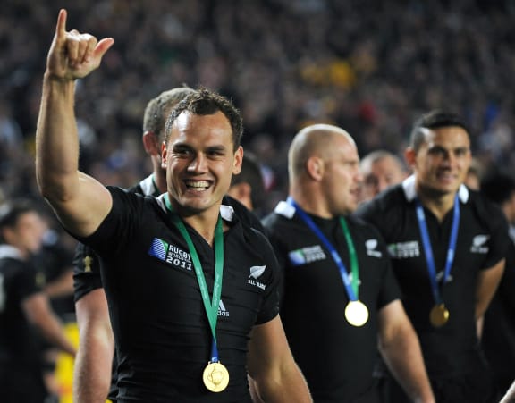 Israel Dagg, left, after the All Blacks beat France to win the World Cup.