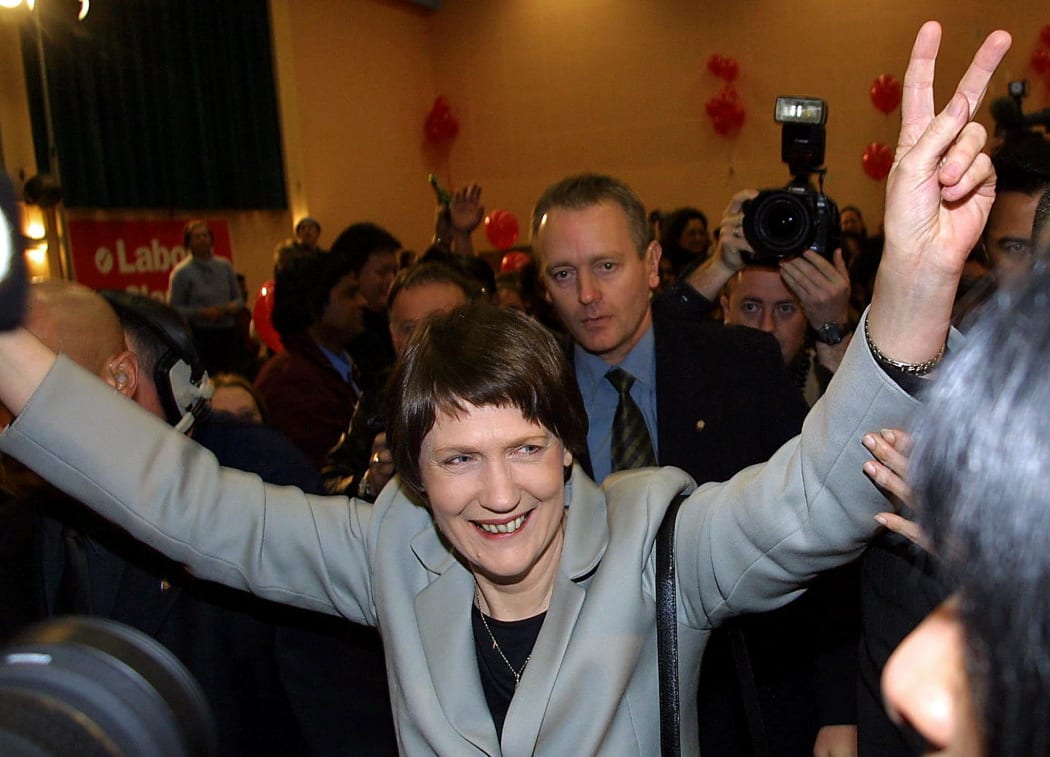 New Zealand Prime Minister Helen Clark  flashes the victory sign as she makes her way onstage after winning the 2002 eleciton.