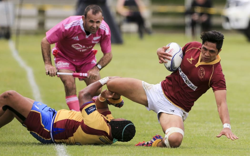 King Country's James Hemara is tackled in the Lochore Cup final against North Otago at Rugby Park, Te Kuiti, New Zealand. Saturday 24 October, 2015. Copyright photo: John Cowpland / www.photosport.nz
