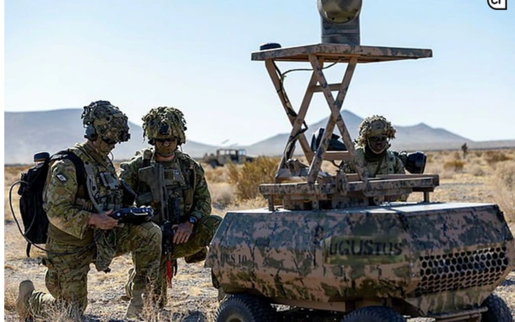 Australian soldiers with a ground drone in California at Project Convergence.