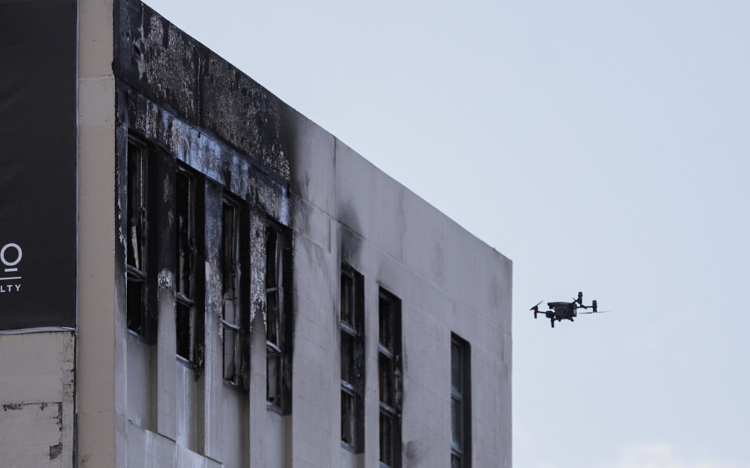 A drone being used by emergency services to inspect the Loafers Lodge hostel on Tuesday afternoon following the tragic fire. 16/5/23