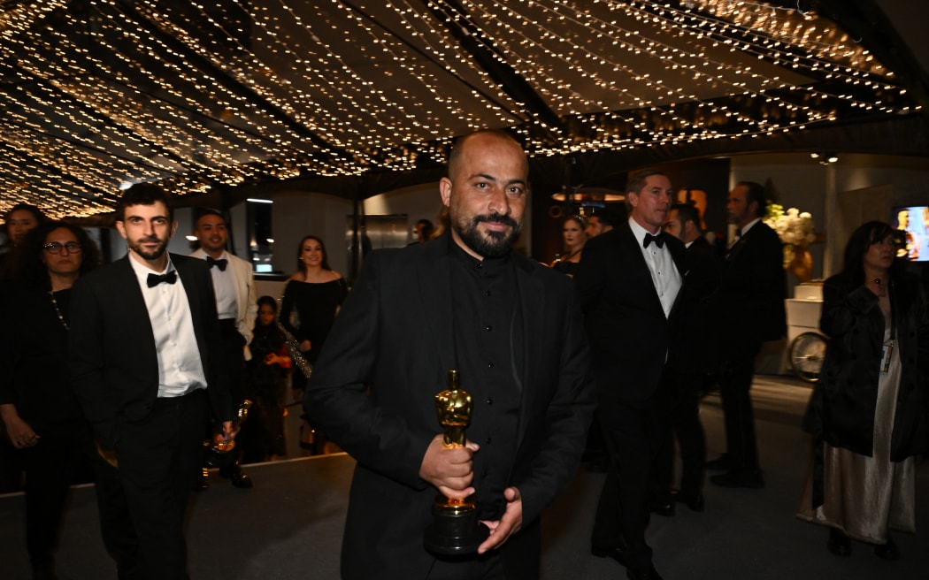 Emirati filmmaker Hamdan Ballal holds his Oscar for Best Documentary Feature for "No Other Land" during the 97th Annual Academy Awards Governors Ball at the Dolby Theatre in Hollywood, California on March 2, 2025. (Photo by ANGELA WEISS / AFP)