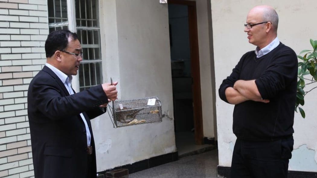 Professor Eddie Holmes with Dr Yong-Zhen Zhang