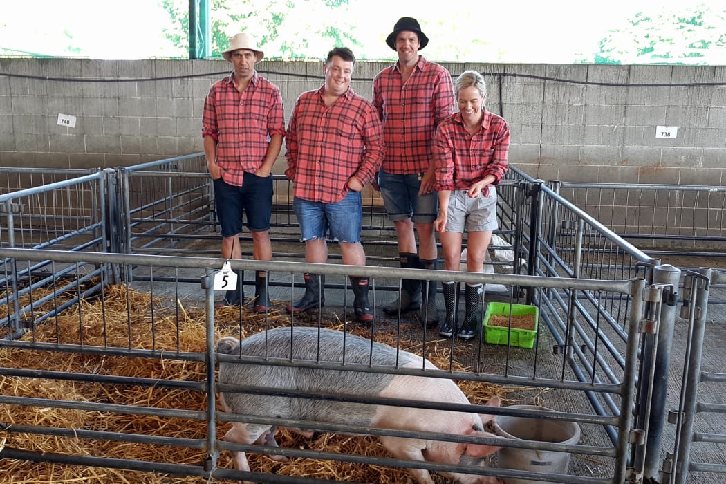 Sean Spencer (2nd from left), big pig and the Pigs@Work syndicate