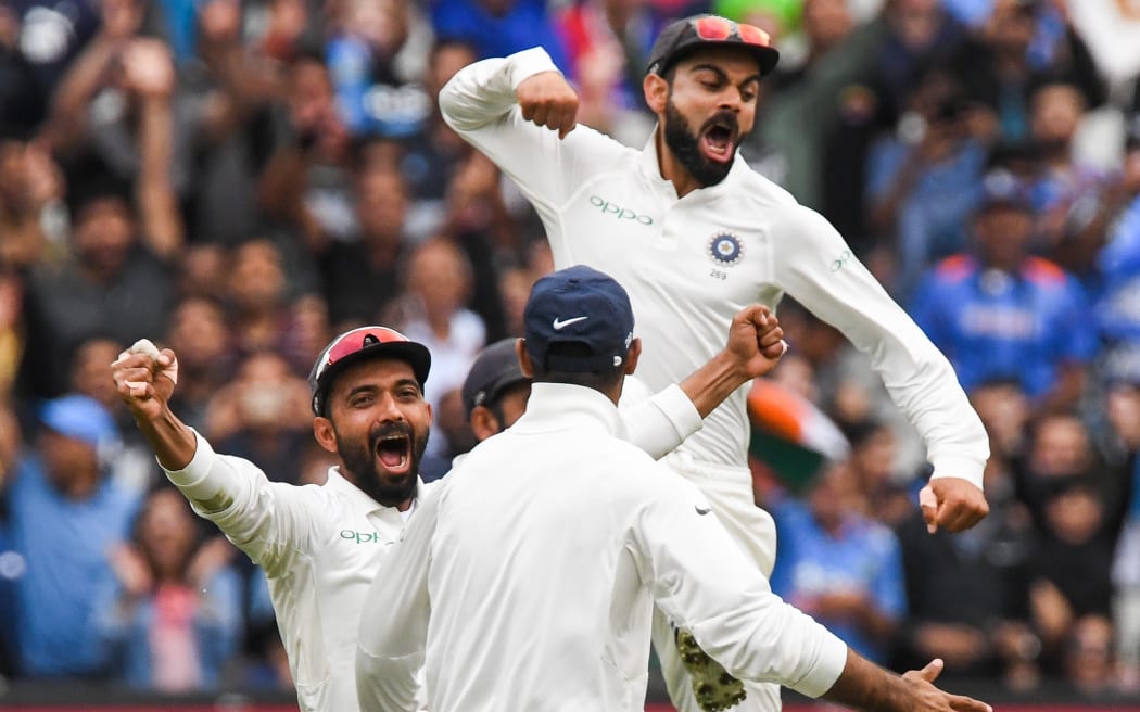 Virat Kohli celebrates their test win in Melbourne.