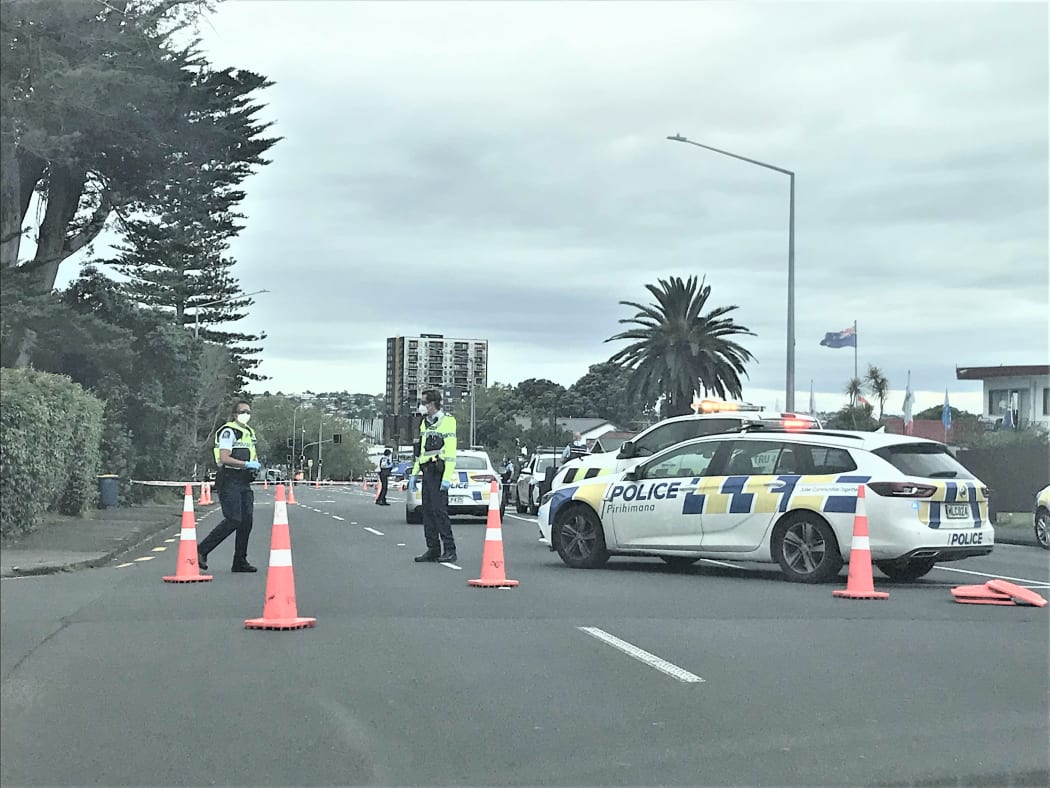 Police at the scene in New Lynn, Auckland where a homicide investigation was launched after a person died on Friday morning.