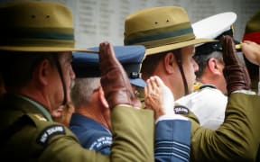 Members of the NZDF saluting at Armistice Day commemorations in Auckland in 2015