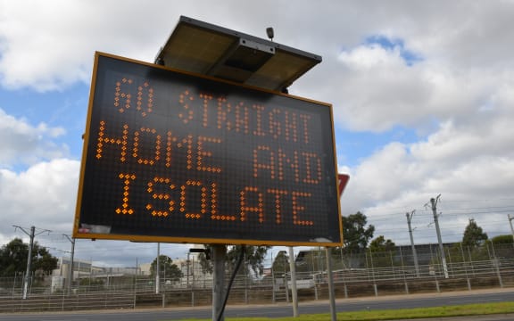 \A warning sign is seen as part of Covid-19 precautions as Australia's Victoria state reimposes lockdown.
