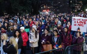 A vigil at Parliament calling for New Zealand to double its refugee quota.