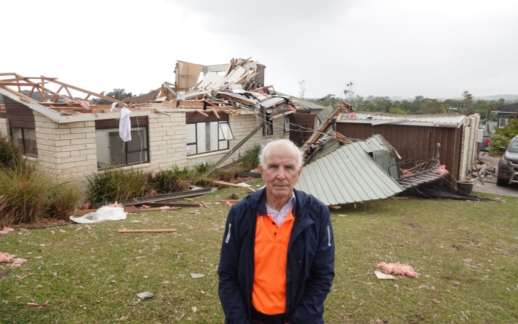 Alan Johnson with what was left of his home after the Mangawhai storm, 26 January 2025.