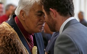 Kaumatua for Hineuru Piri Prentice (left) having a hariru/hongi with Benedict Taylor of the Office of Treaty Settlements.