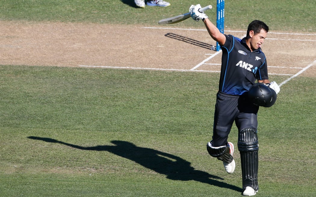 Ross Taylor celebrates his century on the last ball.