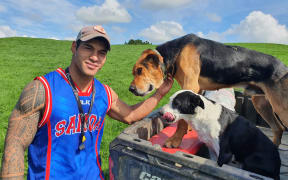 Junior with his dogs Diesel and Sue