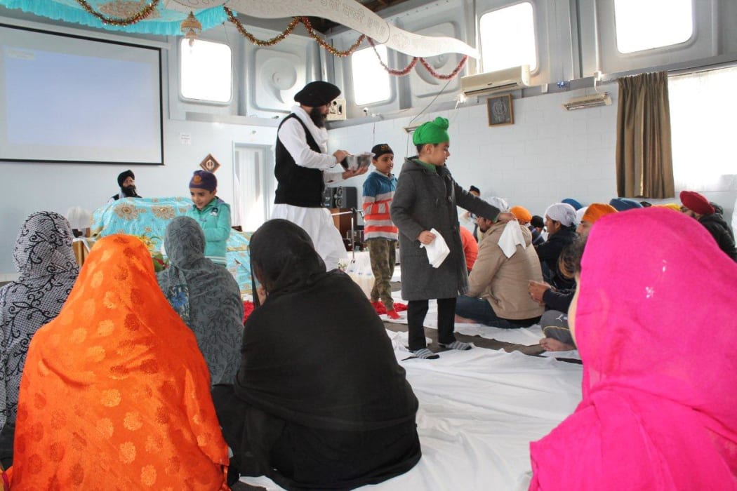 Giving of prashad