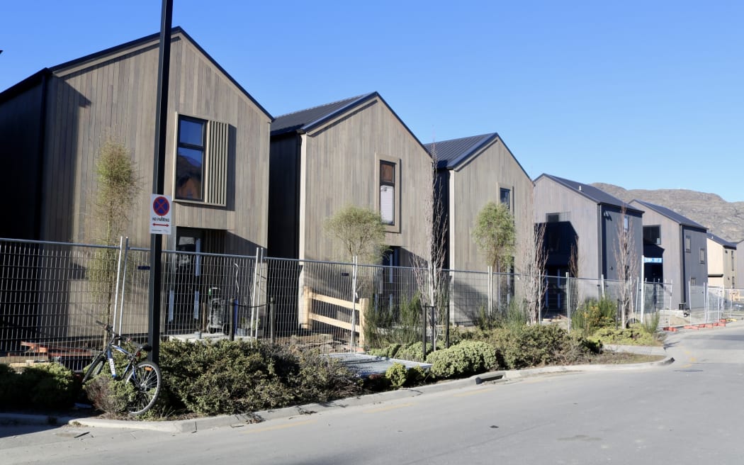 Commercial dehumidifiers were visible in the windows of at least eight homes.
