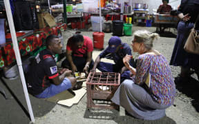 RNZ Pacific journalist Sally Round talks to locals in Nadi.