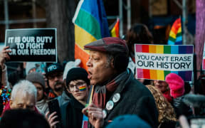 Human Rights activist Jay Walker speaks to protesters as they gather at the Stonewall National Monument, where the LGBTQ+ rights movement was born, after authorities removed the Pride flag from the Greenwich Village site.