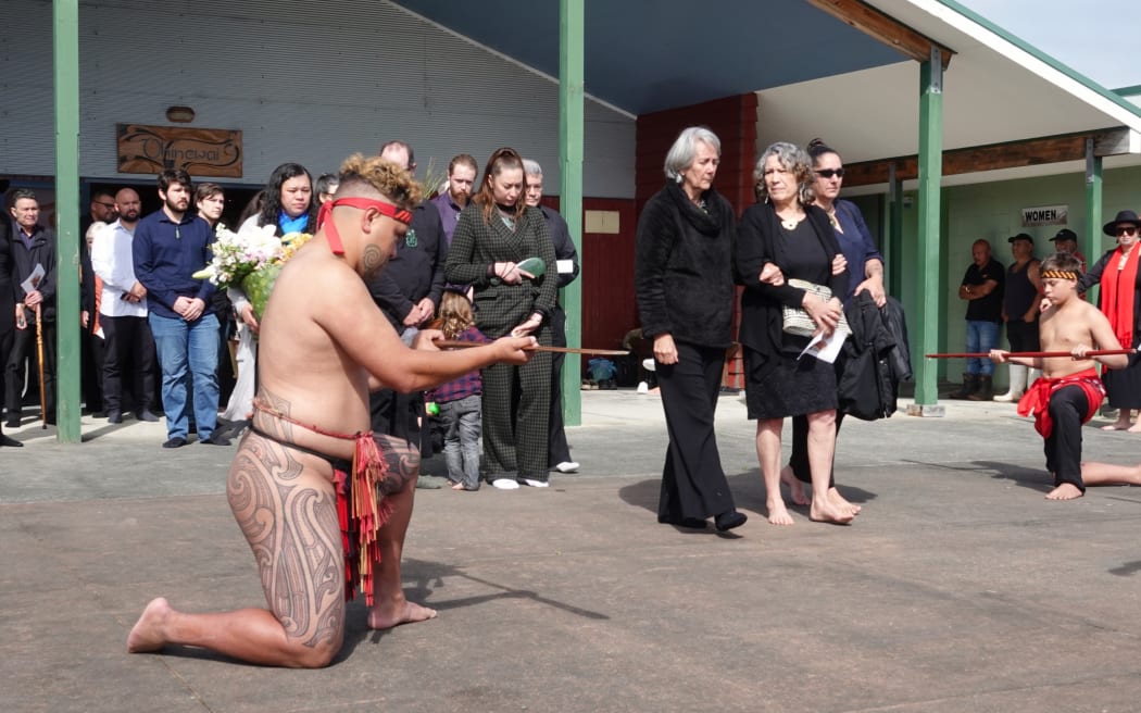 Members of Tā Patu Hohepa's whānau leave Otātara marae as his tangi ends on 25 September, 2023.