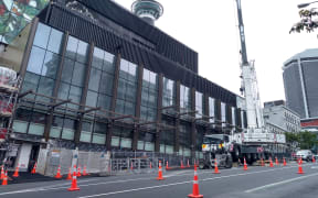 Cordons around SkyCity remain as firefighters continue to monitor and investigate the damaged roof area where the blaze erupted.