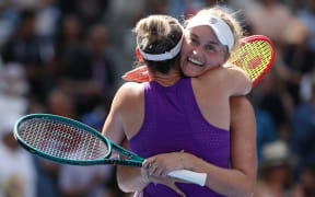 Erin Routliffe of New Zealand celebrates with partner Gabriela Dabrowski of Canada after winning the 2025 US Open doubles title.