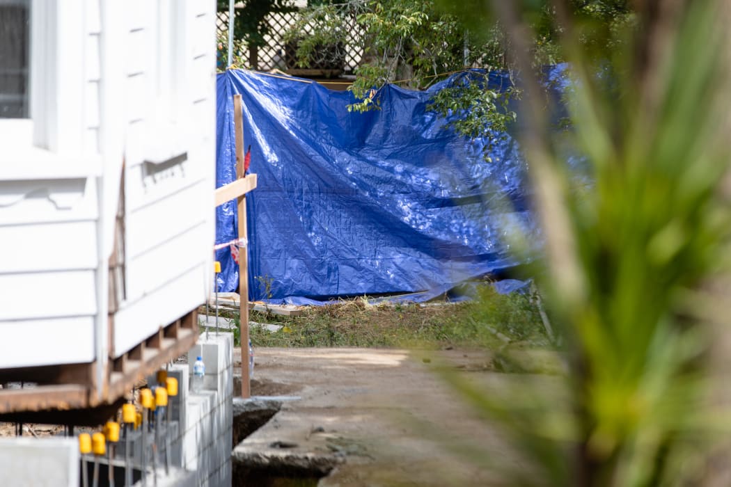 Police remained at the scene at 3 Marlborough Street yesterday.