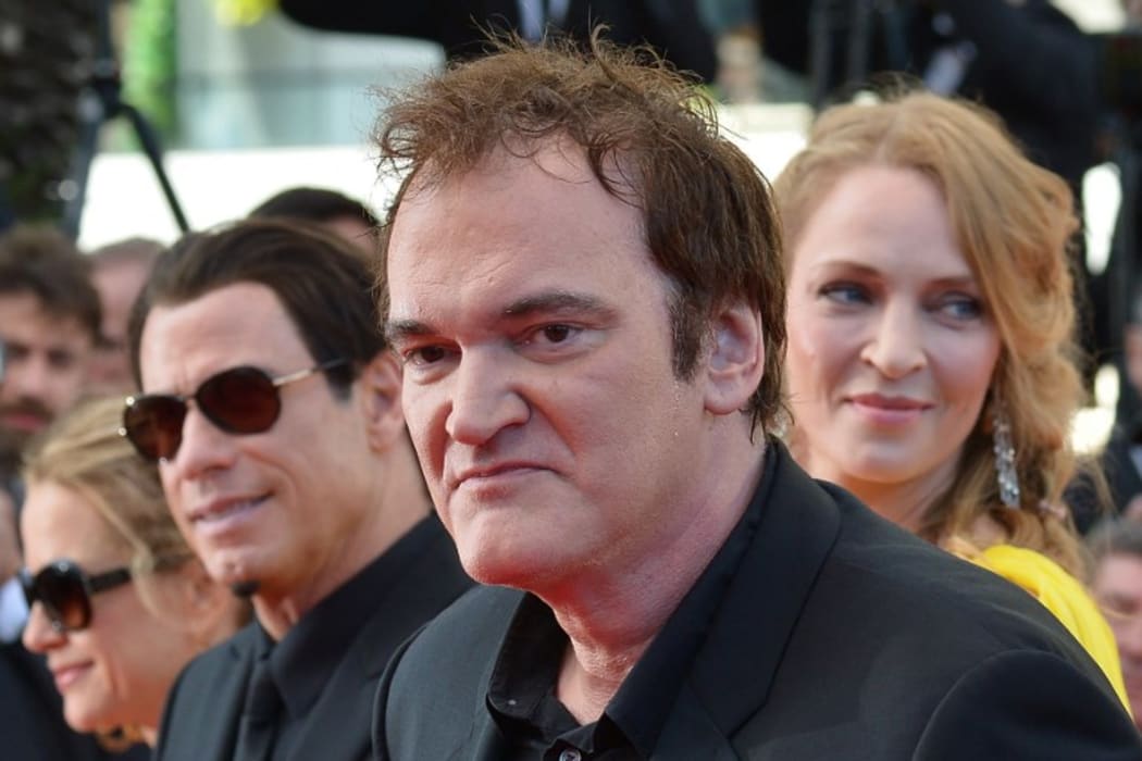 US director Quentin Tarantino arrives with actor John Travolta and Uma Thurman, pictured in 2014.