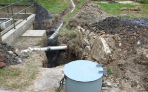 Exposed wastewater plant pipework in Waipori Falls.
