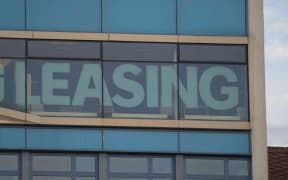 leasing sign on a building