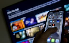 2022-01-19 12:42:43 ILLUSTRATIVE - Applications from streaming services Disney Plus, Amazon Prime Video, Apple TV, Videoland and Netflix on a phone.