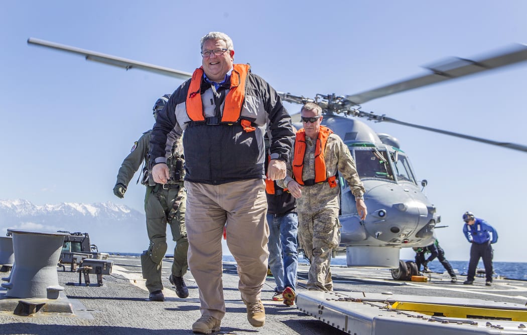 Gerry Brownlee and Tim Keating arrive on the USS Sampson.