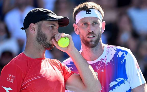 Tim Puetz of Germany and Michael Venus of New Zealand at the Australian Open.