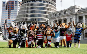 Mascots of NPC and Heartland teams outside the Beehive.