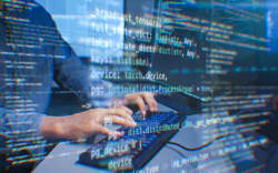 Programmer Typing with Computer Code Overlay, Cybersecurity and Artificial Intelligence Programming Background, Modern Coding and Machine Learning Development concept