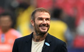 Former English football player David Beckham looks on before the start of the 2023 ICC Men's Cricket World Cup one-day international (ODI) first semi-final match between India and New Zealand at the Wankhede Stadium in Mumbai on November 15, 2023. (Photo by Punit PARANJPE / AFP) / -- IMAGE RESTRICTED TO EDITORIAL USE - STRICTLY NO COMMERCIAL USE -- - -- IMAGE RESTRICTED TO EDITORIAL USE - STRICTLY NO COMMERCIAL USE --