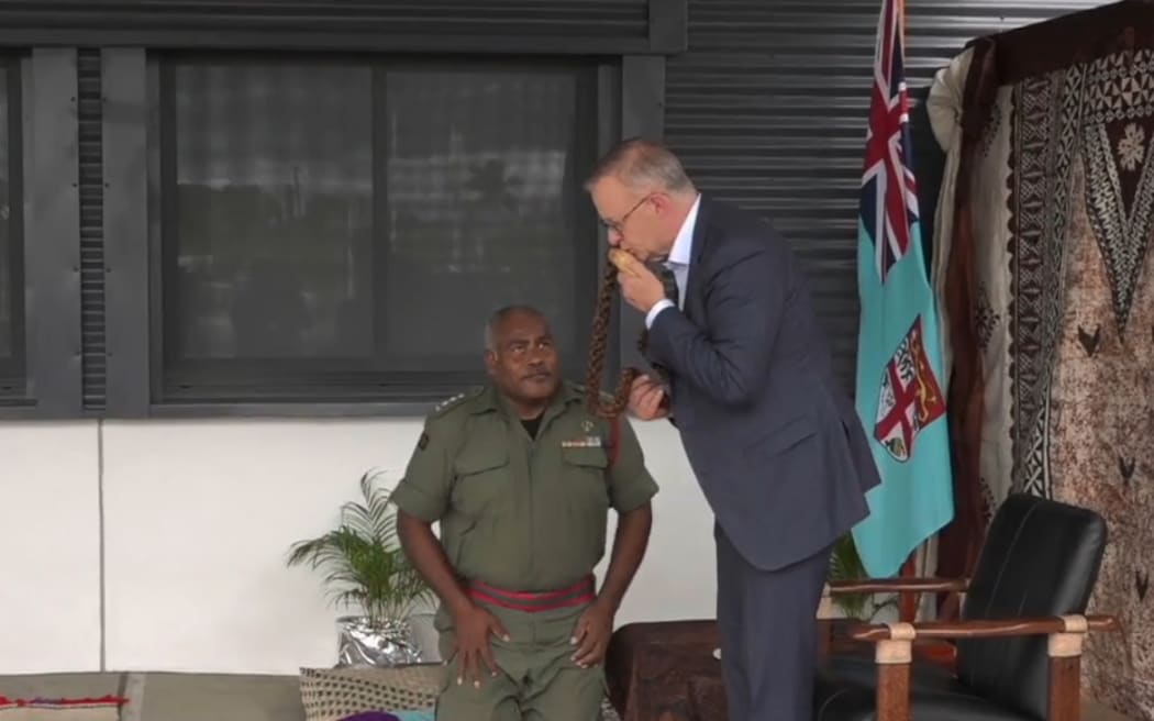 Australian PM  Anthony Albanese receives a tabua during the traditional welcome to Fiji at the Black Rock Army Camp in Nadi on 15 March 2023.