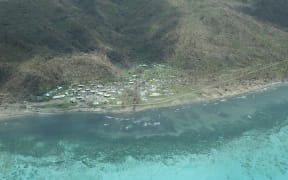 An aerial view of a village on Koro Island, Fiji