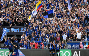 Auckland FC fans and supporters celebrate a goal by Neyder Moreno.