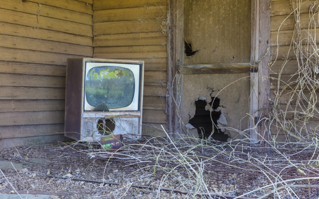 [Homestead, Georgia, United States] Old TV set on front porch of an abandoned homestead. (Photo by Mint Images / Mint Images / Mint Images via AFP)