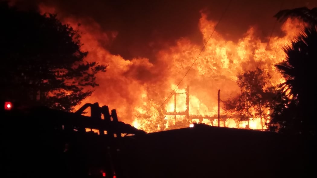 The New Plymouth house at the centre of a nearly 12-hour standoff with police earlier this month has gone up in flames.