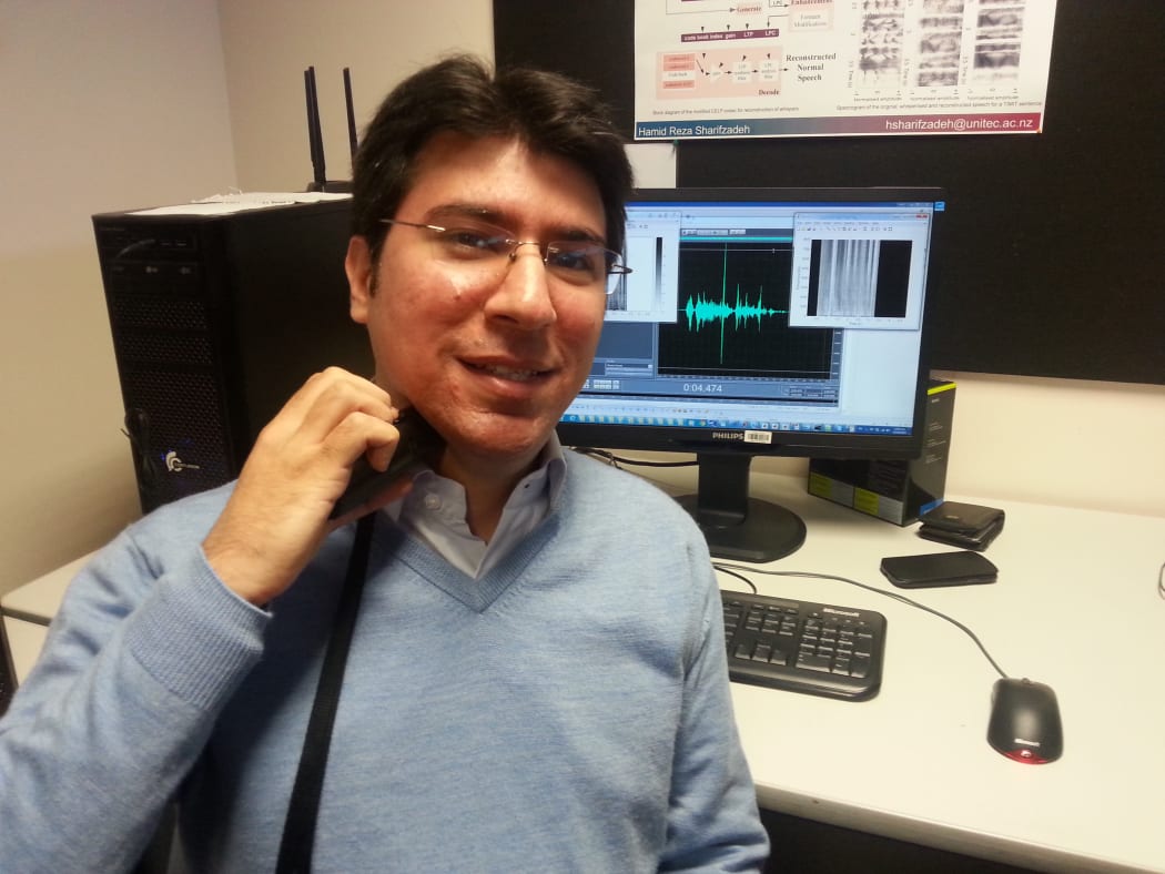 Hamid Sharifzadeh demonstrates the use of an electro larynx.